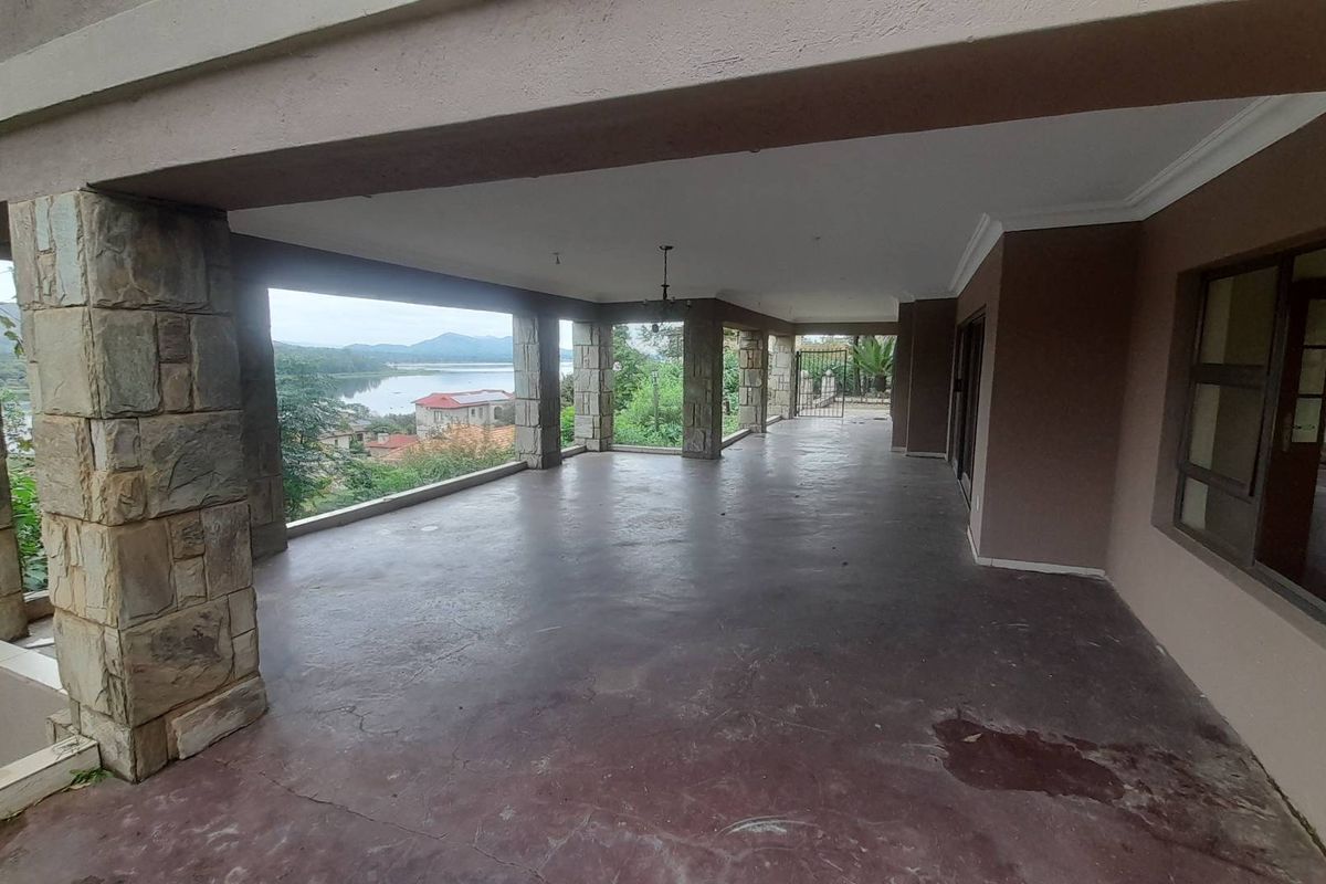 Luxury Awaits: Expansive Mansion with Dam Views! - Photo 4