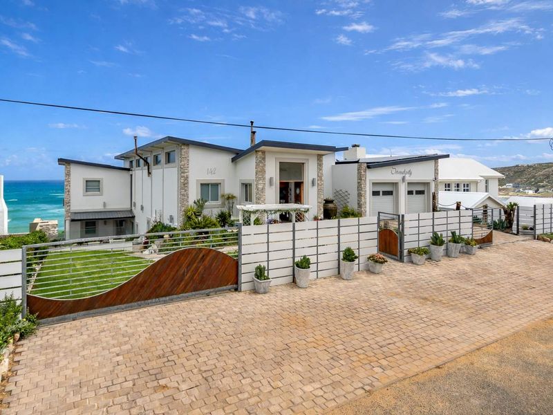 Beachfront Home on sandy shores - A Coastal Gem - Photo 3