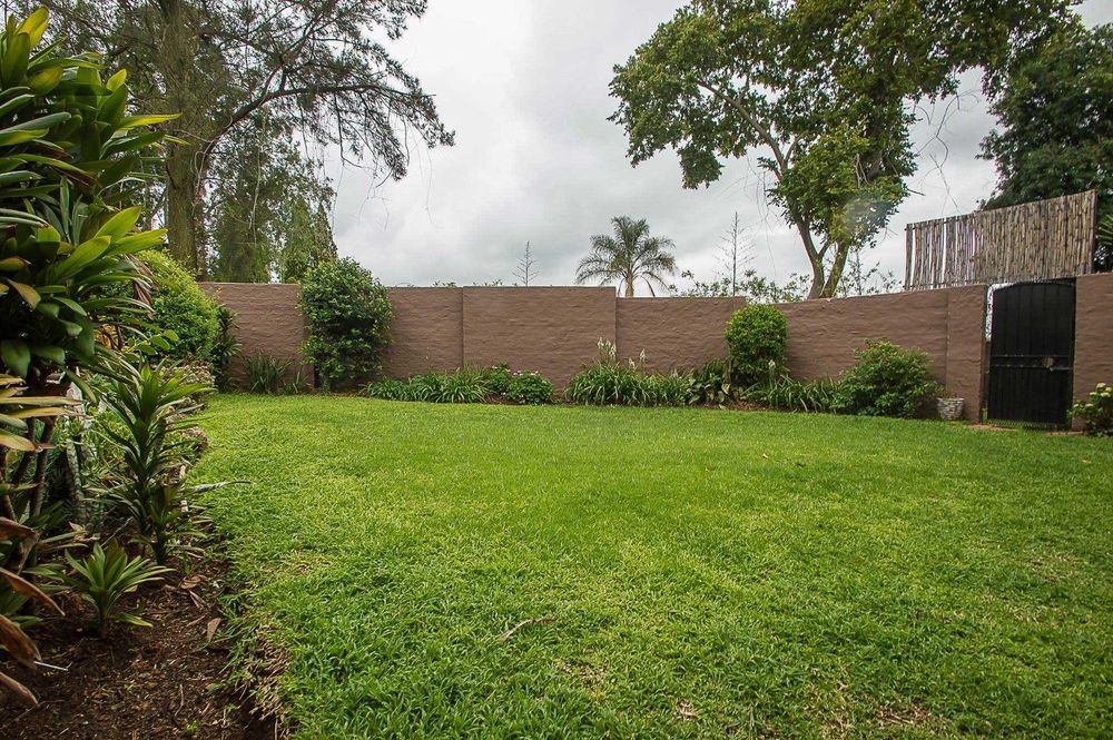 Rolling lawns and established garden beds for the garden lover and family time 