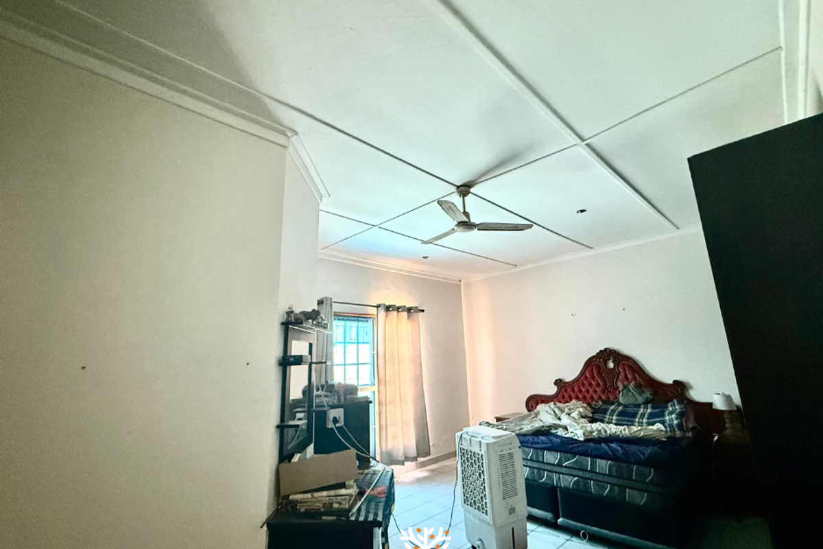 A bedroom featuring tiled flooring, a ceiling fan, and a window with curtain rods.