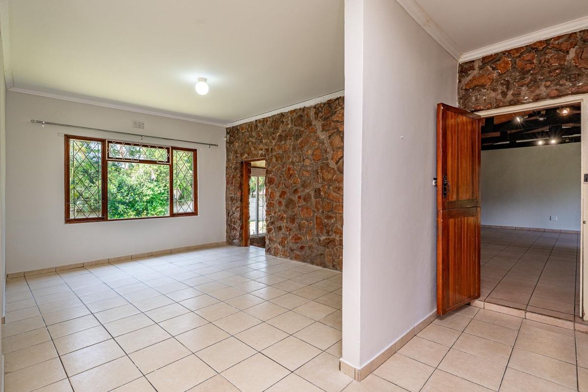 PRIME WATERFALL 1 | CHARACTER STONE HOME WITH INCOME-GENERATING COTTAGE - Photo 5