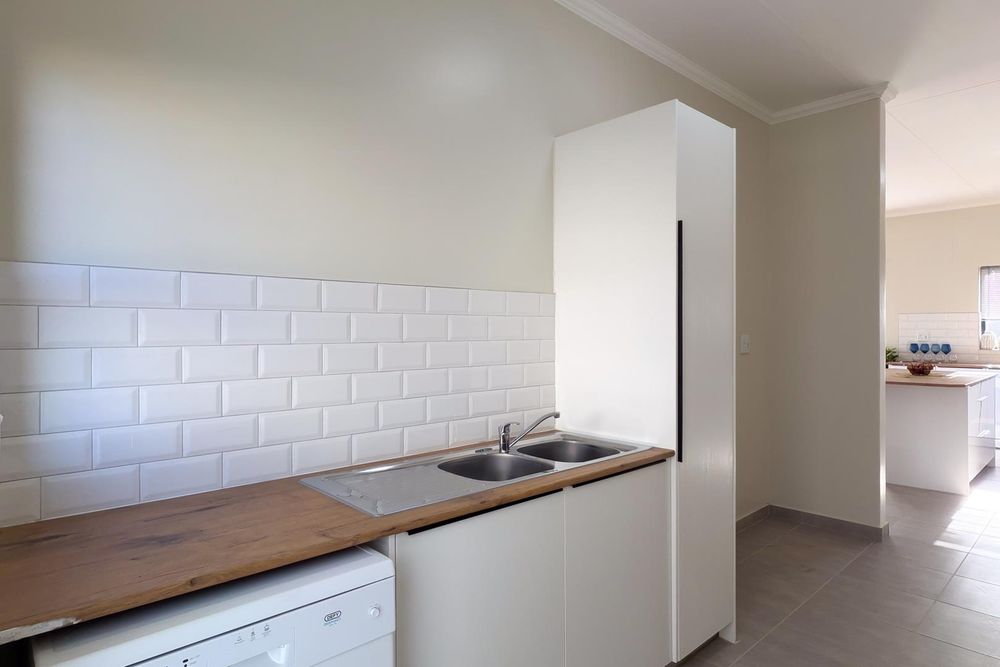 Separate scullery room.