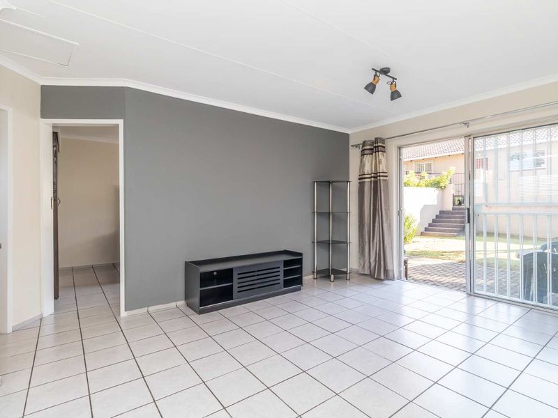 Spacious 1 Bedroom Townhouse with Expansive Private Garden | Sunrock Village Gem - Photo 5