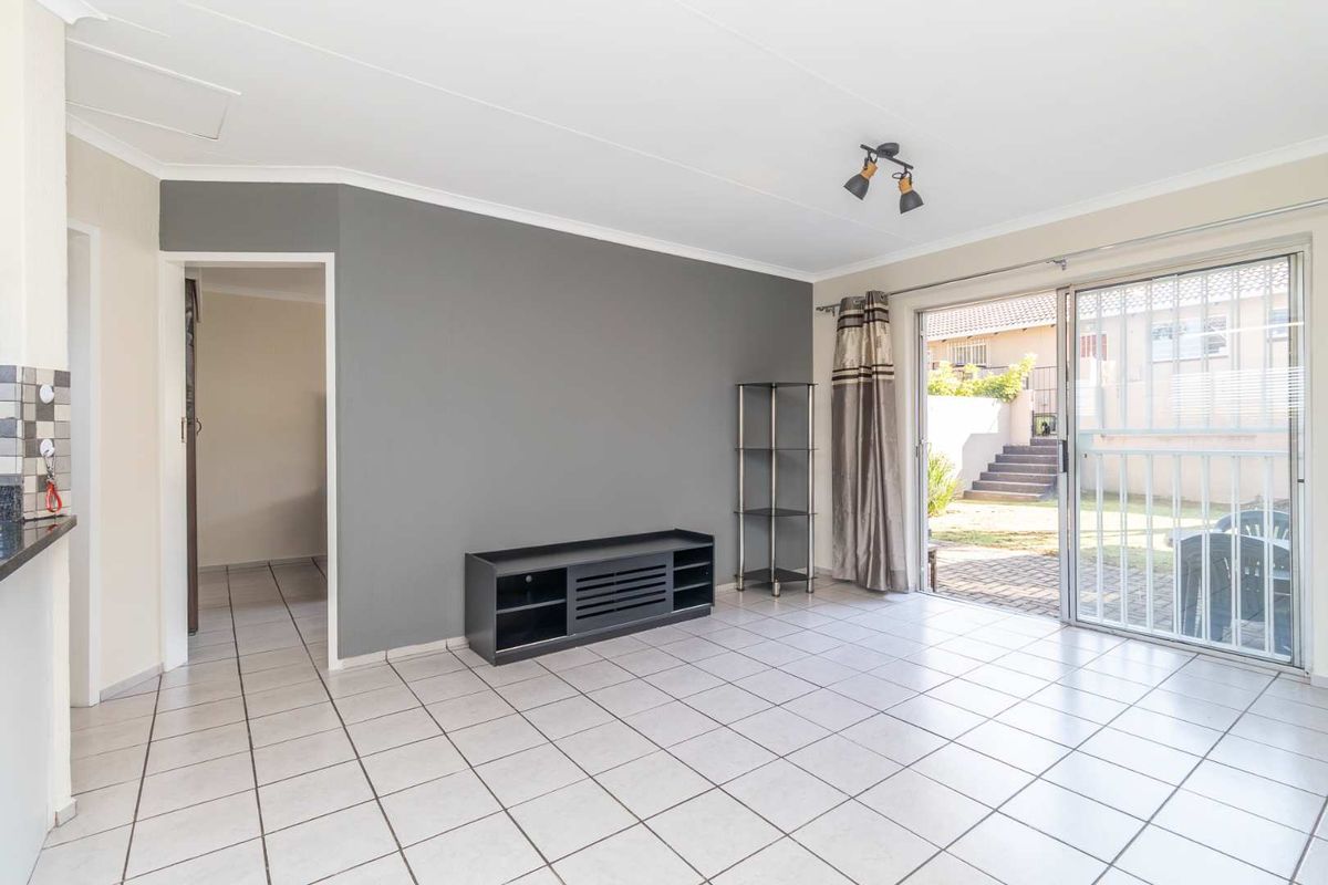 Spacious 1 Bedroom Townhouse with Expansive Private Garden | Sunrock Village Gem - Photo 5