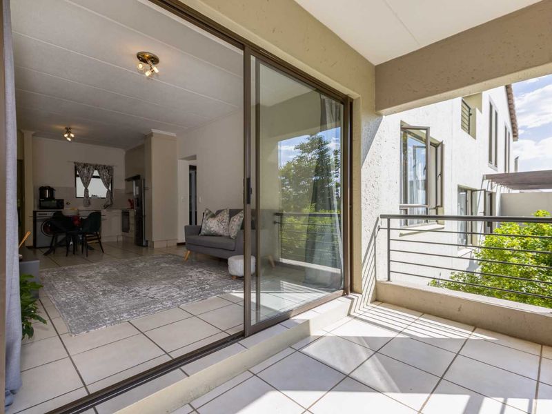 A WELL- POSITIONED MIDDLE FLOOR UNIT IN SOUGHT AFTER TEQUILA SUNRISE - Photo 10