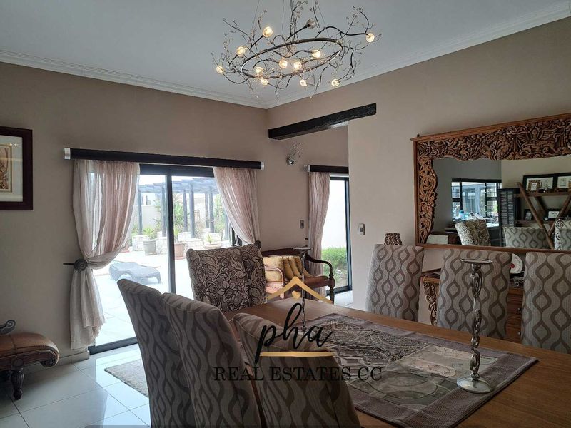 Entertainer’s DREAM!!! Immaculate 3 bedroom family home with swimming pool for sale in Walvis Bay - Photo 6
