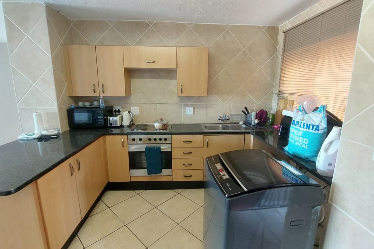 Open-Plan Living: Your Dream 2 Bedroom Home Awaits! - Photo 3