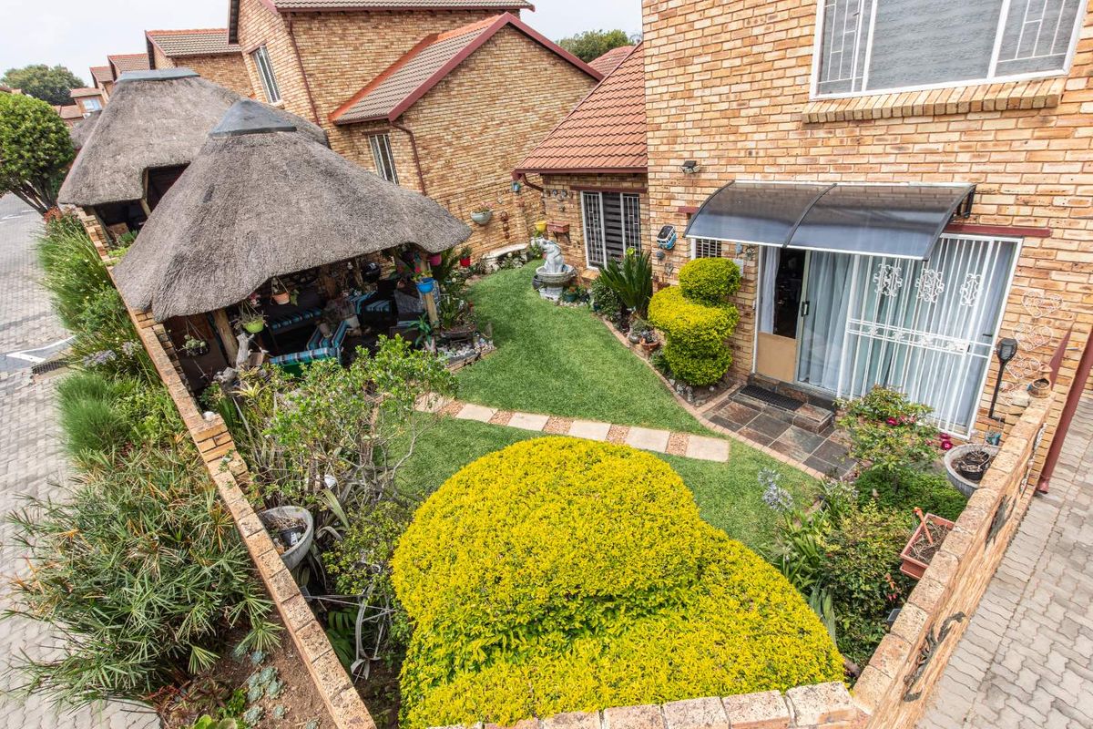 Charming Duplex with Modern Comforts in Pristine Condition - Photo 2