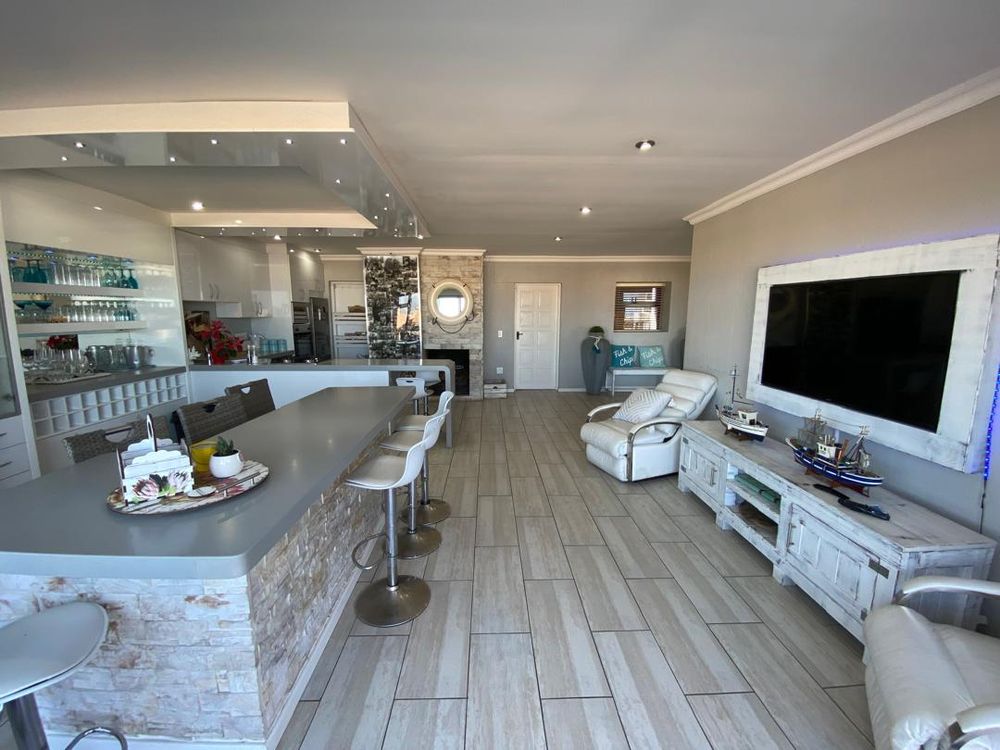 First floor open-plan lounge, kitchen and lounge with balcony