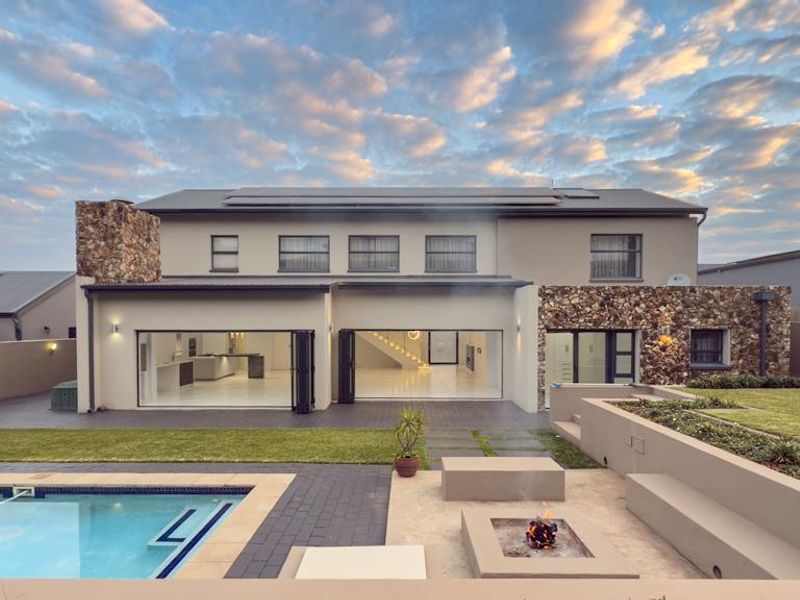 Hilltop Haven | Modern Multi-Level Marvel with Solar Power, Blueline Kitchen & Entertainer’s Garden - Photo 2