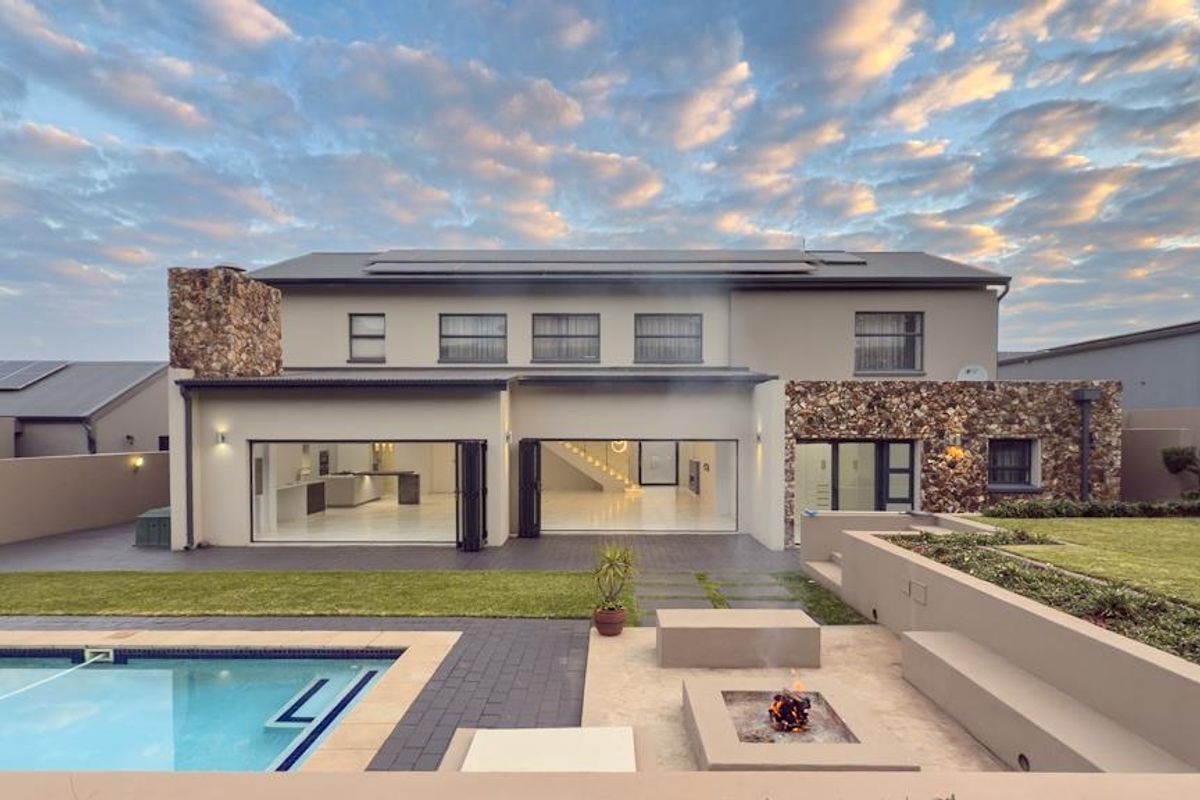Hilltop Haven | Modern Multi-Level Marvel with Solar Power, Blueline Kitchen & Entertainer’s Garden - Photo 2
