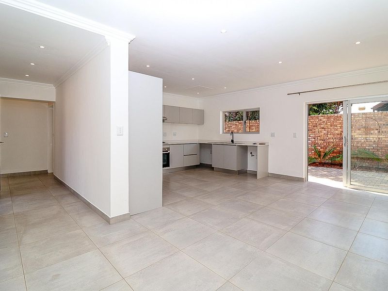 Modern Comfort Meets Secure Garden Living! - Photo 2