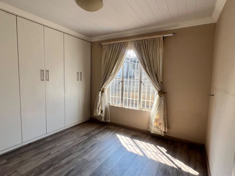 Cook, Relax, and Feel Safe in This Stunning 2-Bedroom Home - Photo 9