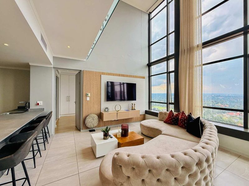 Skyline Elegance: Own a Piece of Sandton's Exclusive Penthouse! - Photo 10