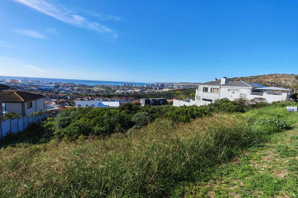 A view of the coastal landscape and surrounding residential area from the vacant residential plot.