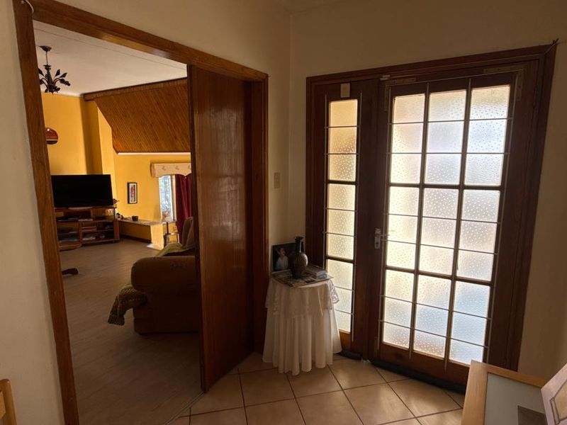 Set high above street level on a massive erf with a large front garden and elevated views - Photo 6