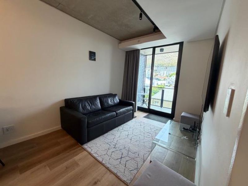 **Experience Modern Luxury Living at Station House** - Photo 2