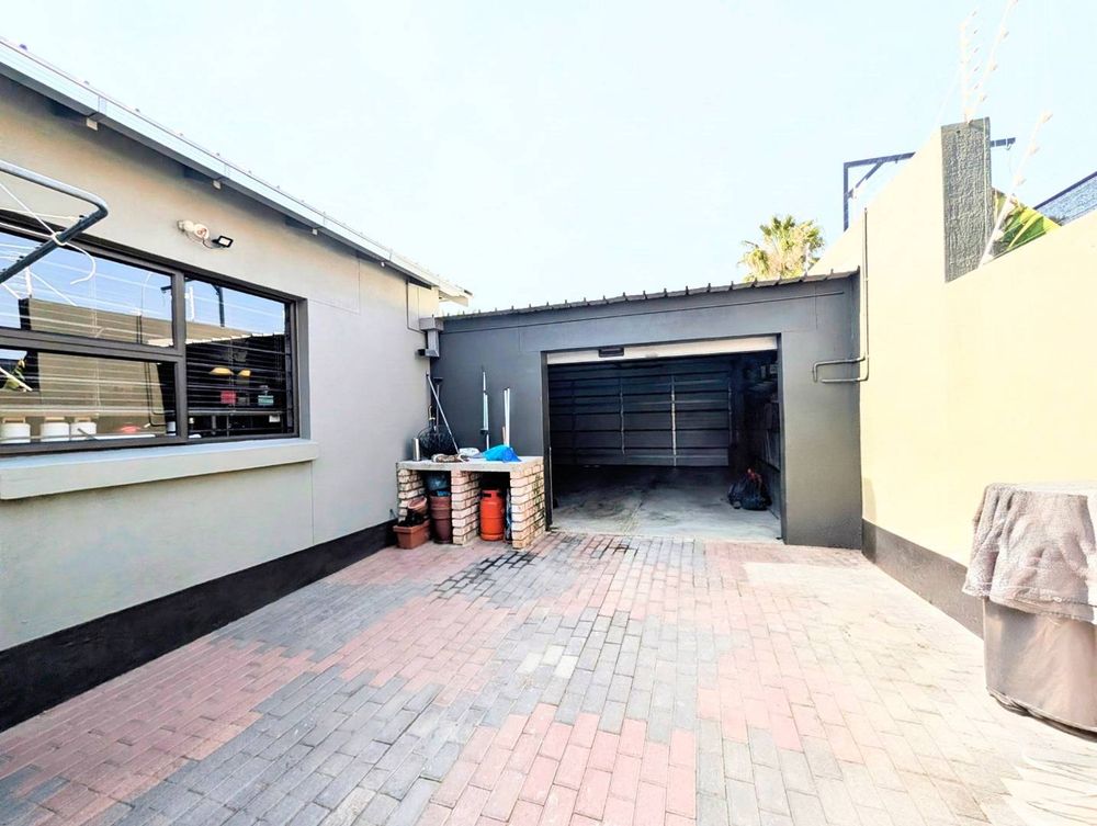 Back yard through the double garage 