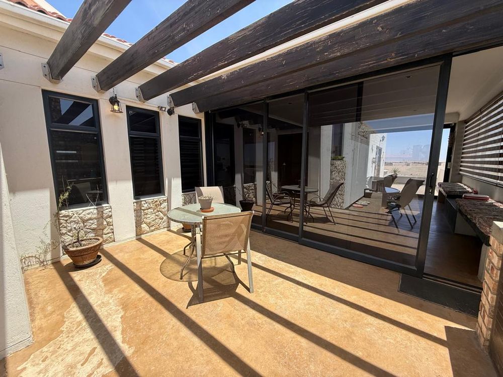 Front entrance and entertainment area with outside BBQ