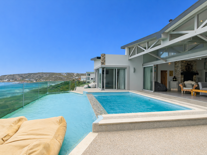 Beachfront Home on sandy shores - A Coastal Gem - Photo 2