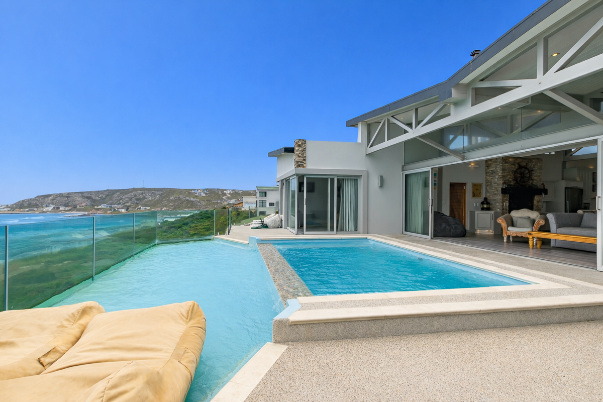 Beachfront Home on sandy shores - A Coastal Gem - Photo 2