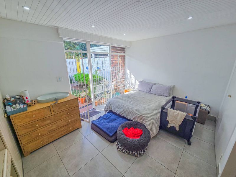 Spacious 1-Bedroom Garden Unit with Covered Veranda - Photo 6