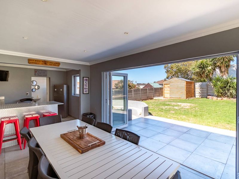 This beautifully renovated home offers modern comfort, excellent entertainment space, and valuable off-grid features — a rare find in central Adcockvale. - Photo 3
