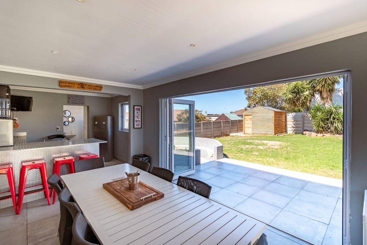 This beautifully renovated home offers modern comfort, excellent entertainment space, and valuable off-grid features — a rare find in central Adcockvale. - Photo 3