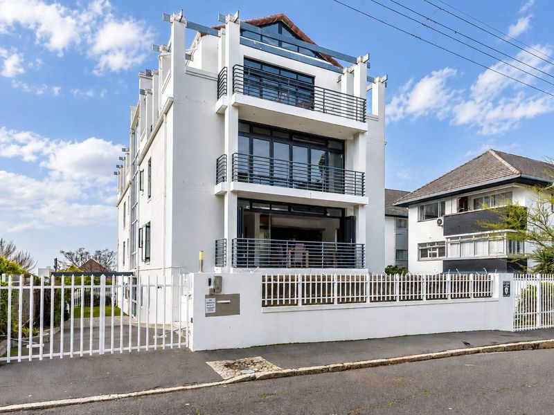 DELIGHTFUL TAMBOERSKLOOF APARTMENT WITH MOUNTAIN VIEWS AND BASEMENT PARKING - Photo 1
