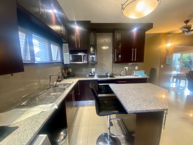 Elegant Ground-Floor Unit with Private Garden in Sought-After Complex - Photo 7