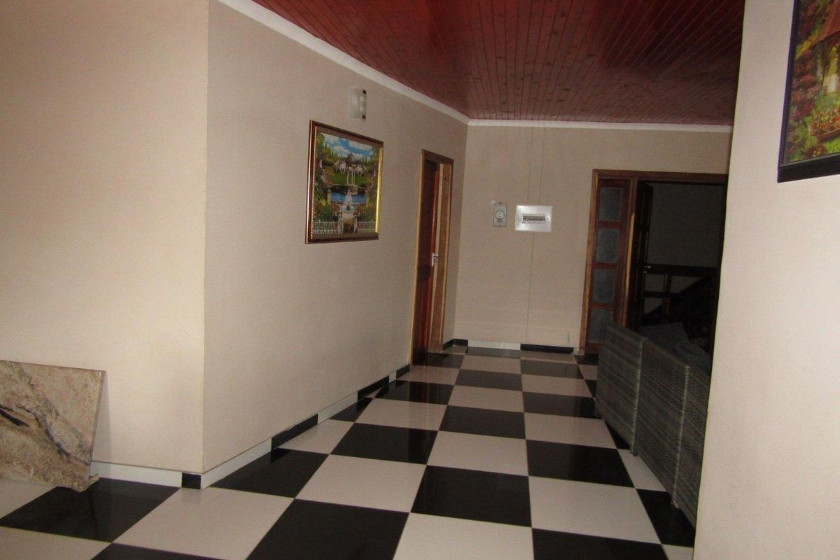 1 x 6 BEDROOM DOUBLE-STOREY HOUSE & 8 x 2 BEDROOM FLATS FOR SALE IN RUNDU: - Photo 4