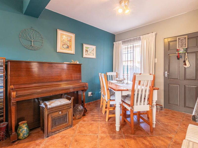 **Charming Duplex with Modern Comforts in Pristine Condition** - Photo 9