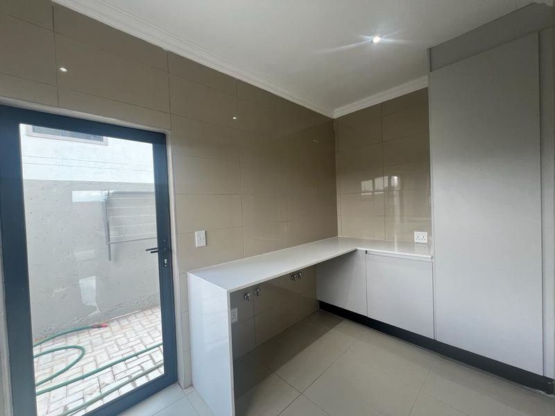 Elegant 4-Bedroom Home in Zambezi Manor Estate - Photo 6