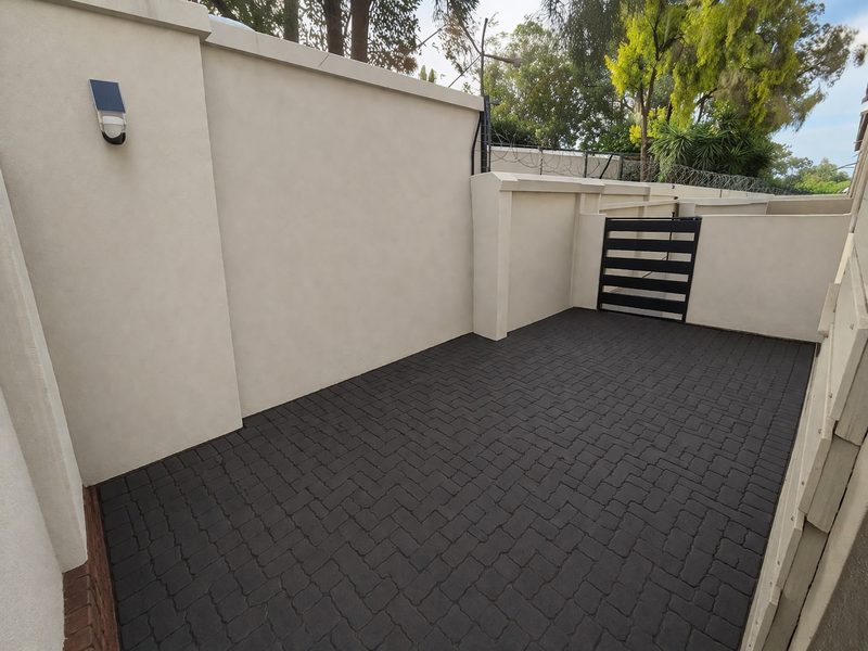 Modern Lock-Up-and-Go Duplex Offering 2 Bedrooms and Double Carport Convenience - Photo 10