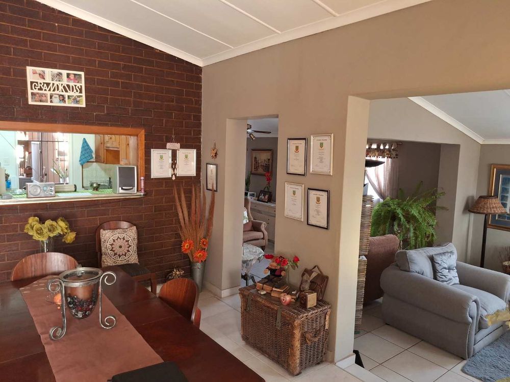 Dining Room leading to Lounge, TV Room and Kitchen
