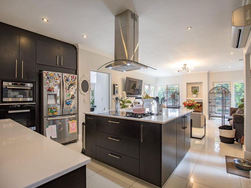 Elegant Four-Bedroom Home with Ample Space Available in Bryanston - Photo 7