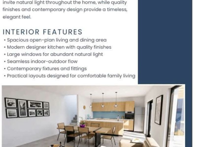 A bright open-plan living, dining, and kitchen area featuring modern cabinetry, pendant lighting, and seamless access to outdoor space.