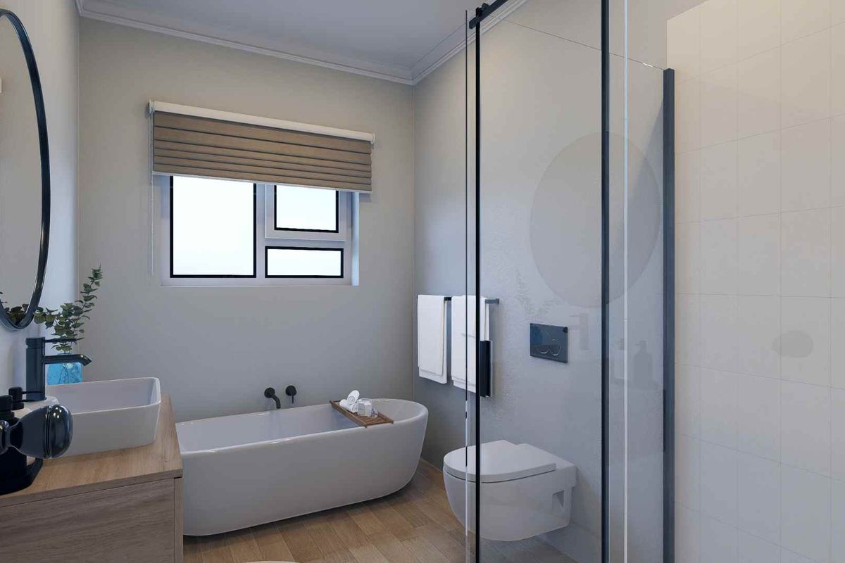 Modern bathroom featuring a freestanding bathtub, wall-mounted toilet, glass-enclosed shower, and a contemporary vanity with a vessel sink.