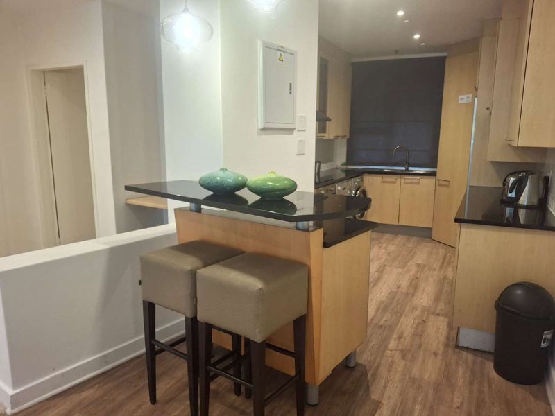 A BEAUTIFULLY FURNISHED TWO BEDROOM APARTMENT - Photo 3
