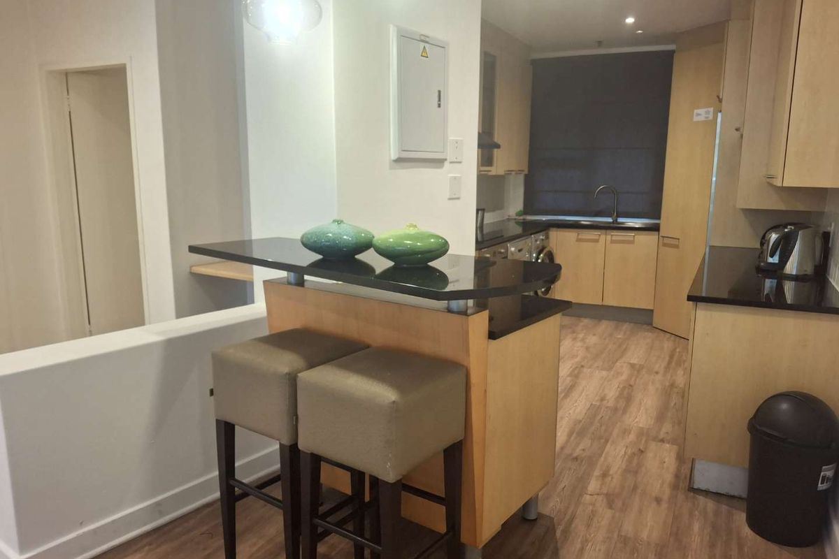 A BEAUTIFULLY FURNISHED TWO BEDROOM APARTMENT - Photo 3