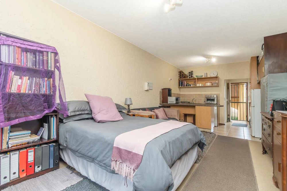 It may be a bahcleors, but you can fit in a desk, bookshelf, big bed and lounge/tv area