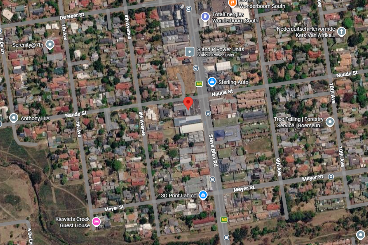 An aerial satellite view showing the urban location and surrounding street network of the property.