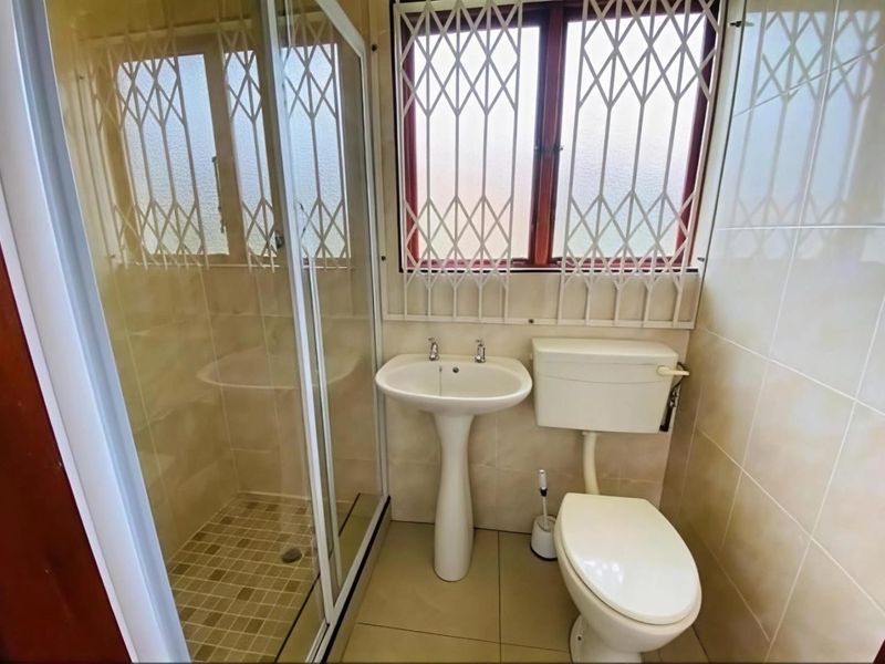 Architectural Masterpiece with Private Oasis in Queensburgh's Malvern - Photo 9