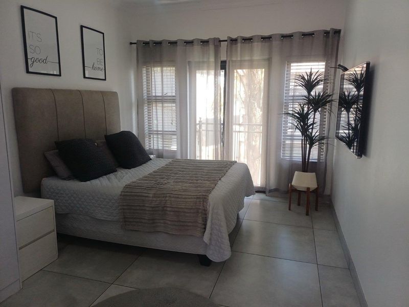 Stylish Double-Storey Cluster with Granny Flat & Poolside Charm - Photo 5