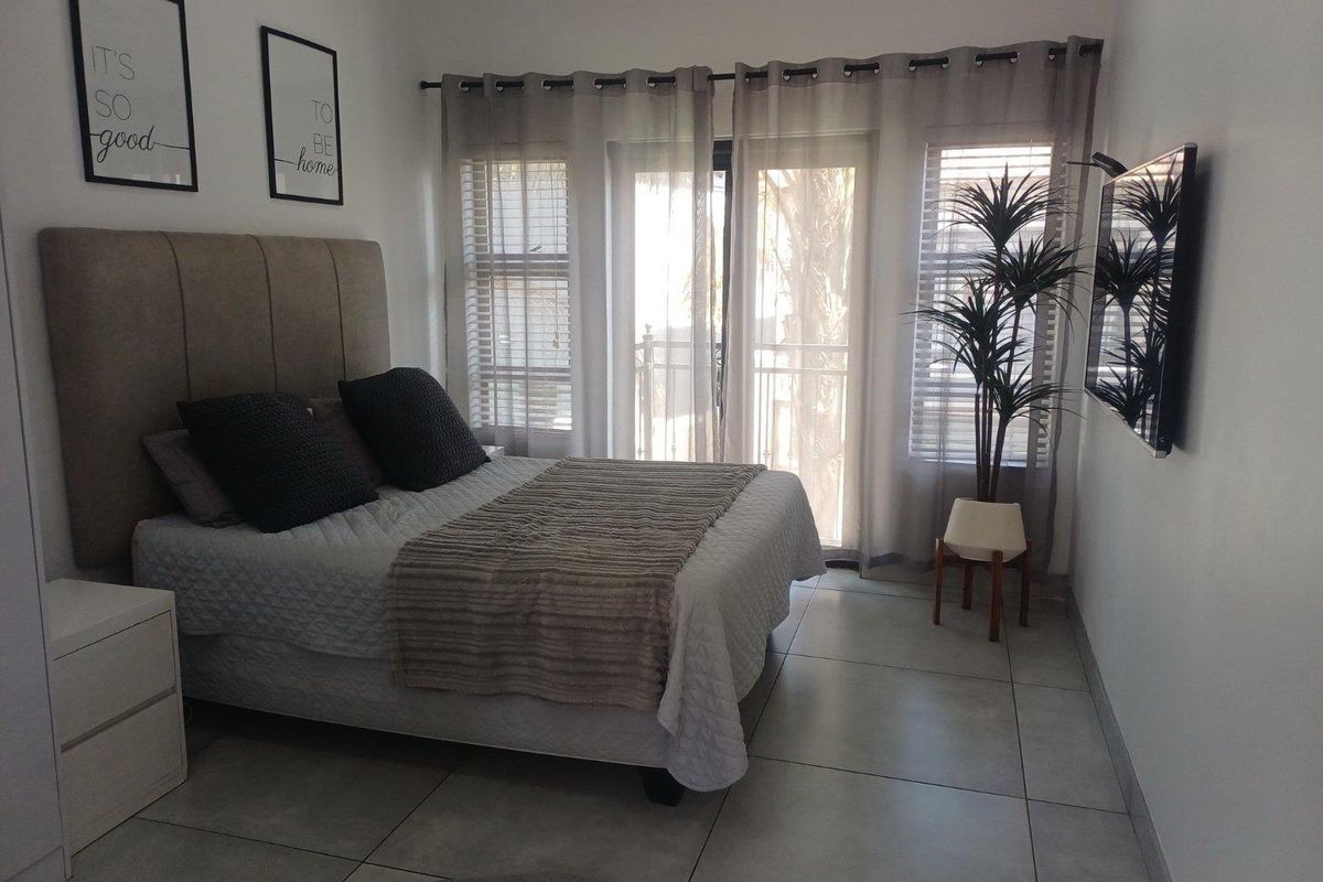 Stylish Double-Storey Cluster with Granny Flat & Poolside Charm - Photo 5