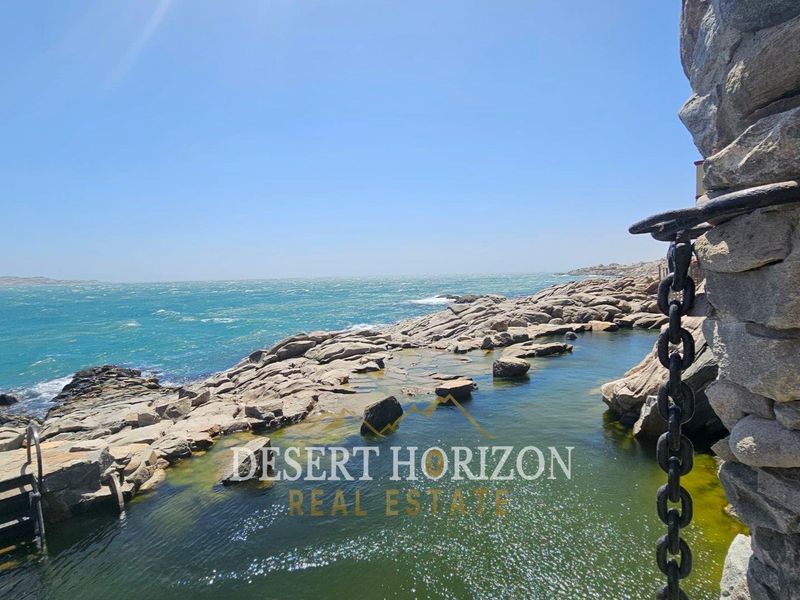 Lüderitz | Beautiful 5-Bedroom Seafront Home with a Unique Rock-Embedded Swimming Pool -Perfectly Blending with the Ocean Horizon - Photo 7