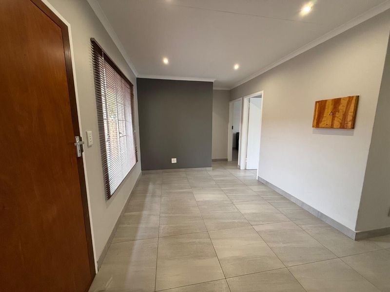 Stylishly Renovated Two-Bedroom Simplex with Double Garage and Garden - Photo 8