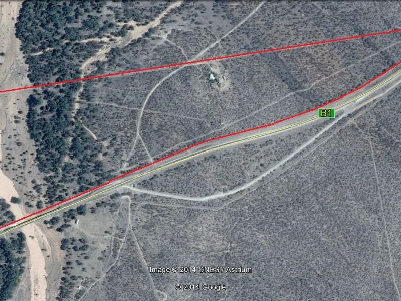 Aerial view of a vacant residential land parcel showing property boundaries and proximity to the B1 highway.