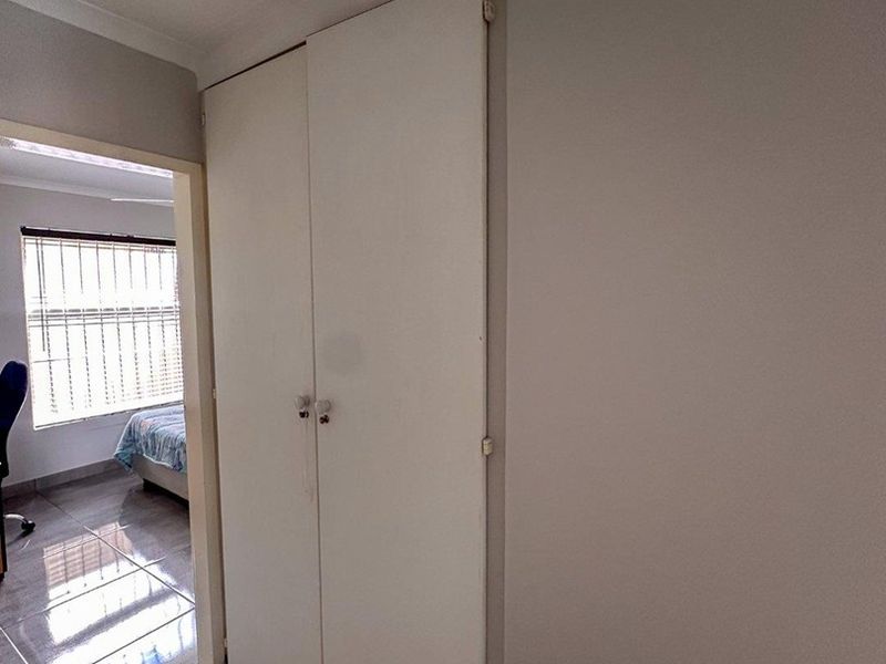 Modern 2-Bedroom Townhouse with Patio and Private Courtyard in Rangeview in Cosmos Complex - Photo 9