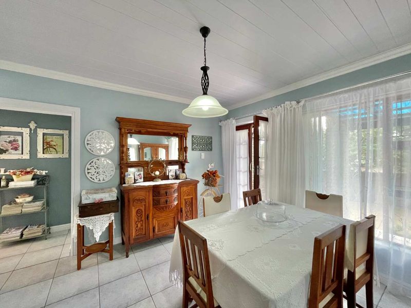 Prestigious Hartenbos Heuwels Home | 4 Bedrooms | Green Belt Views & Exceptional Privacy - Photo 5